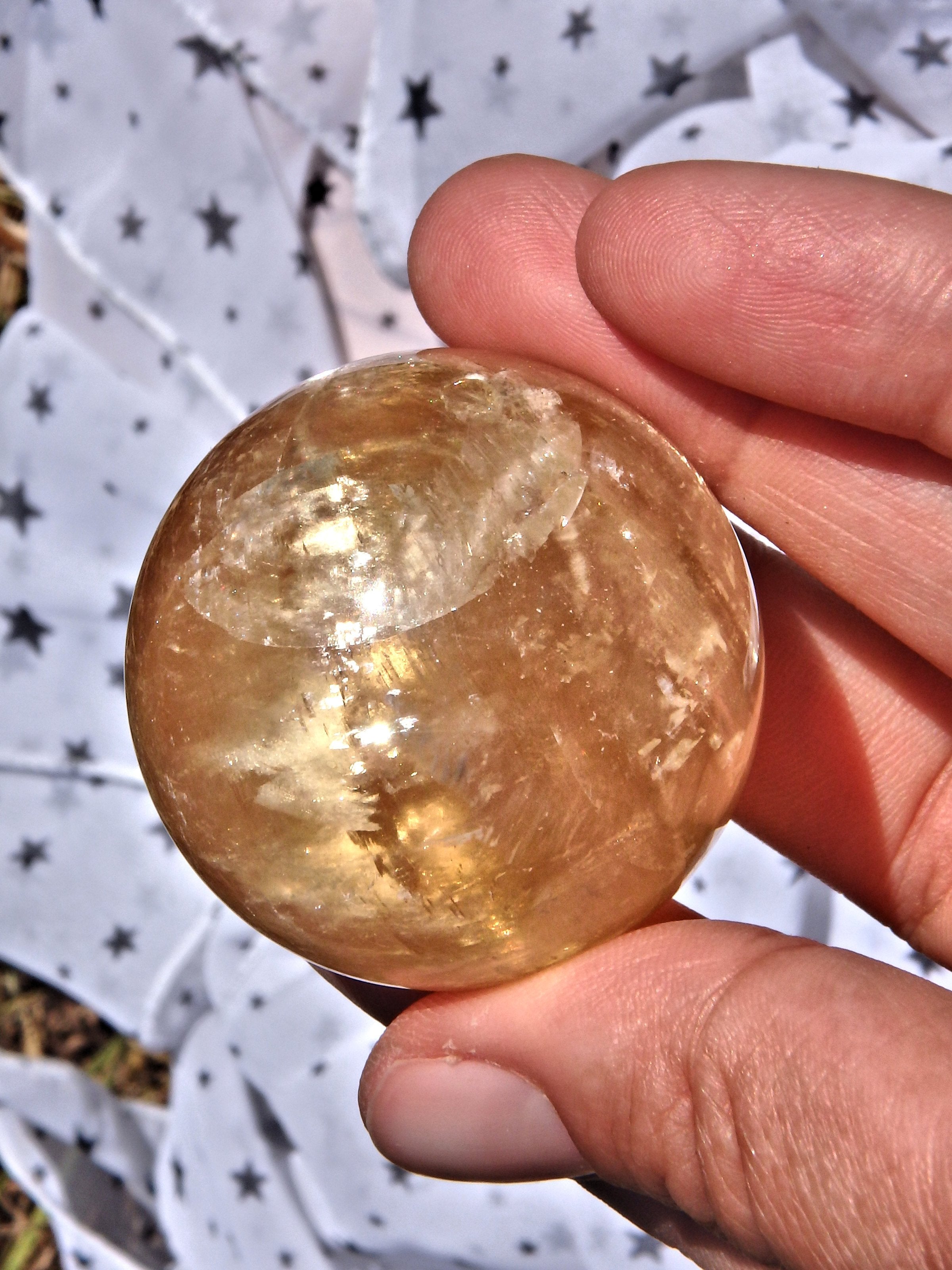 Uplifting Optical Golden Honey Calcite Sphere Carving With Rainbows 2 - Earth Family Crystals