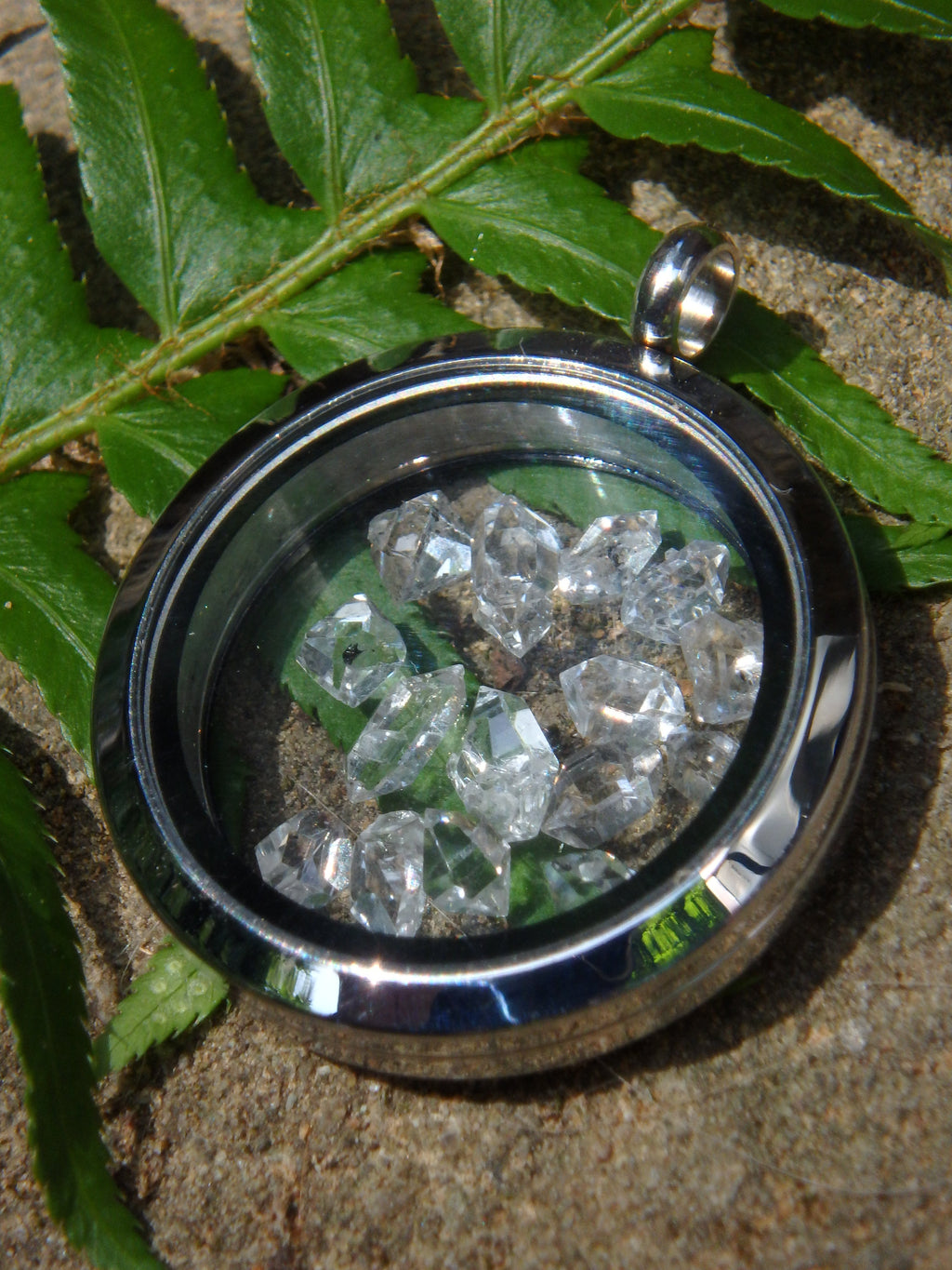 Extreme Brilliance Herkimer Diamonds Floating in Stainless Steel Locket Style Pendant (Includes Silver Chain) - Earth Family Crystals