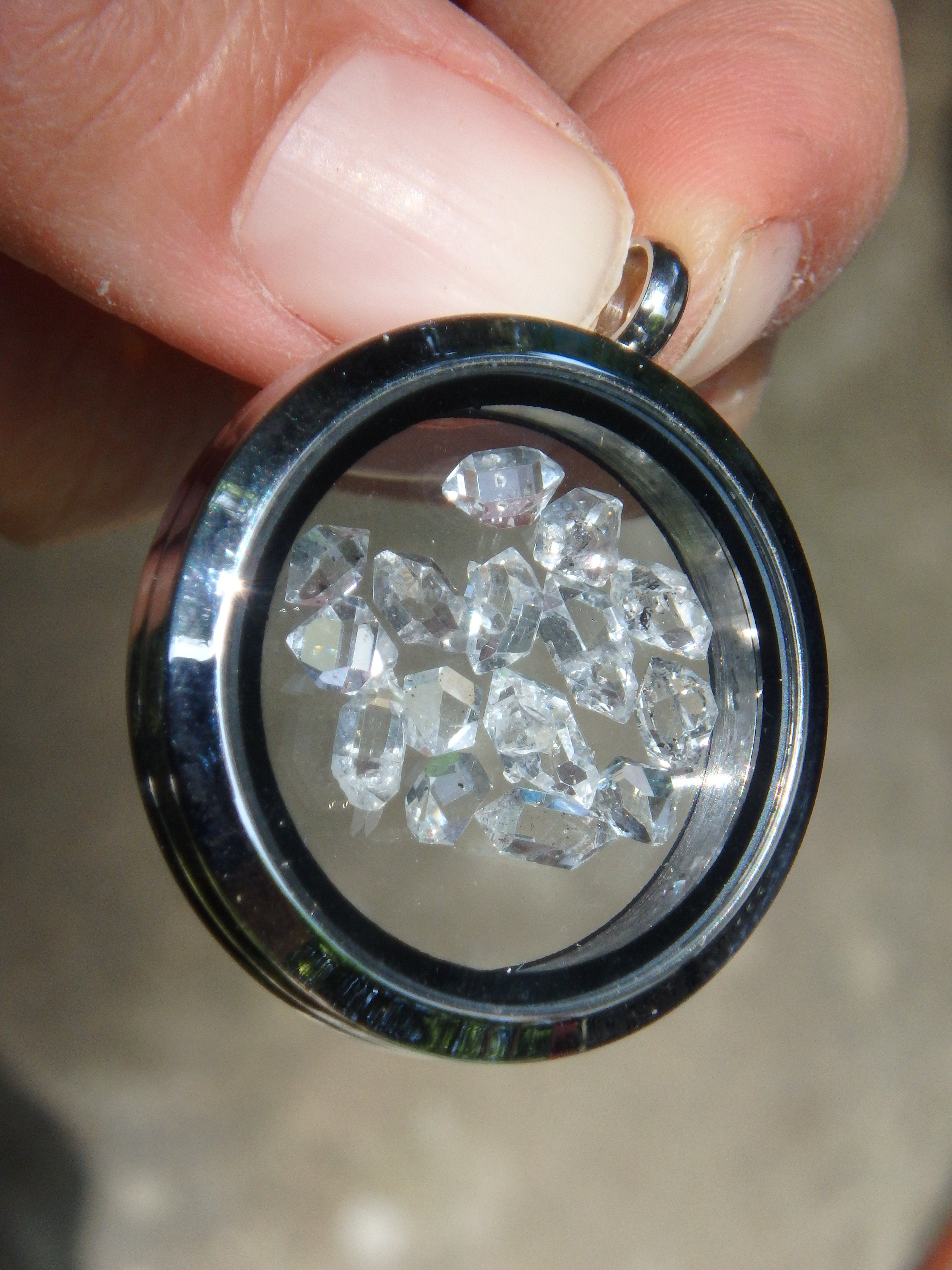 Extreme Brilliance Herkimer Diamonds Floating in Stainless Steel Locket Style Pendant (Includes Silver Chain) - Earth Family Crystals