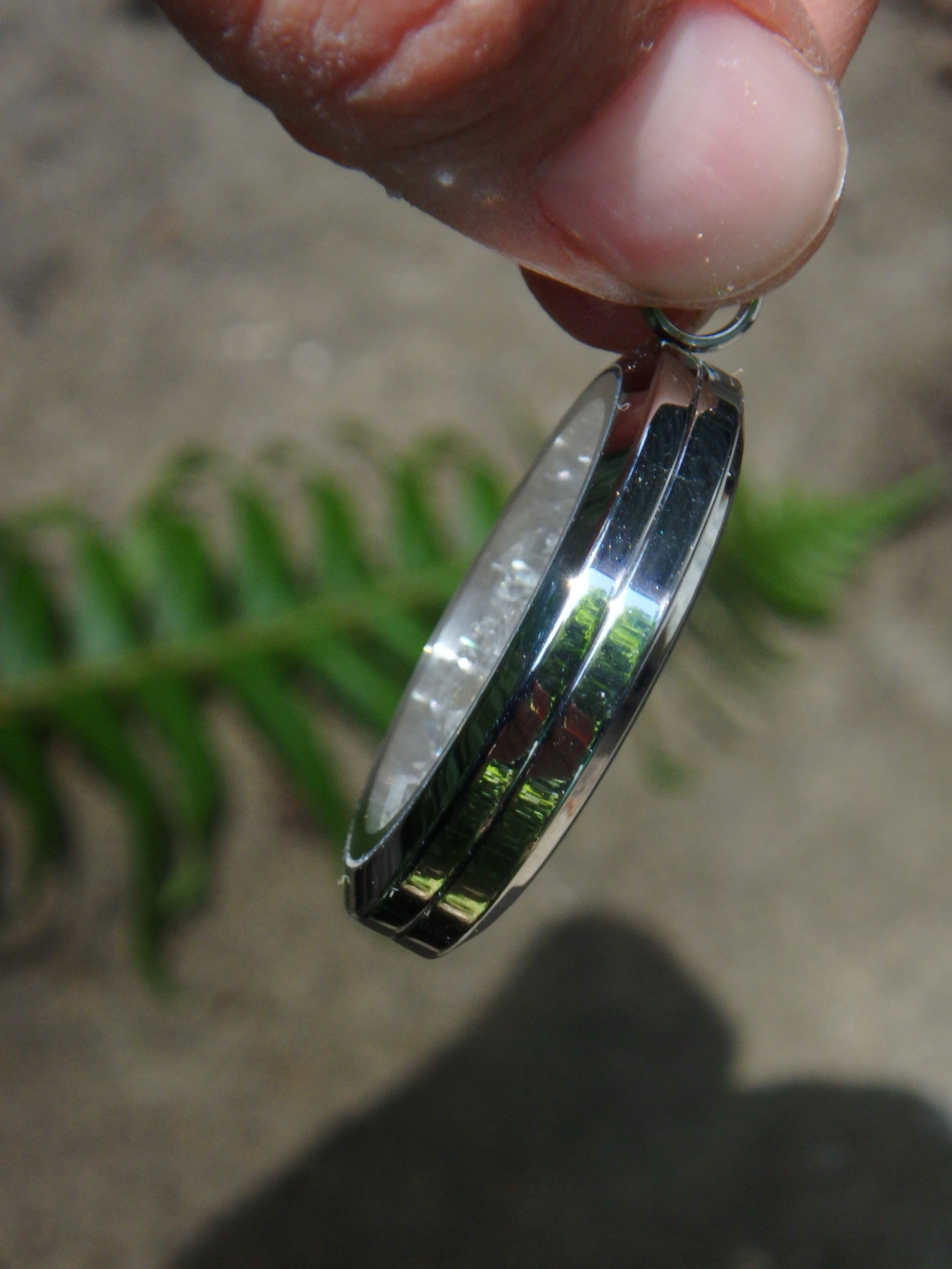 Extreme Brilliance Herkimer Diamonds Floating in Stainless Steel Locket Style Pendant (Includes Silver Chain) - Earth Family Crystals