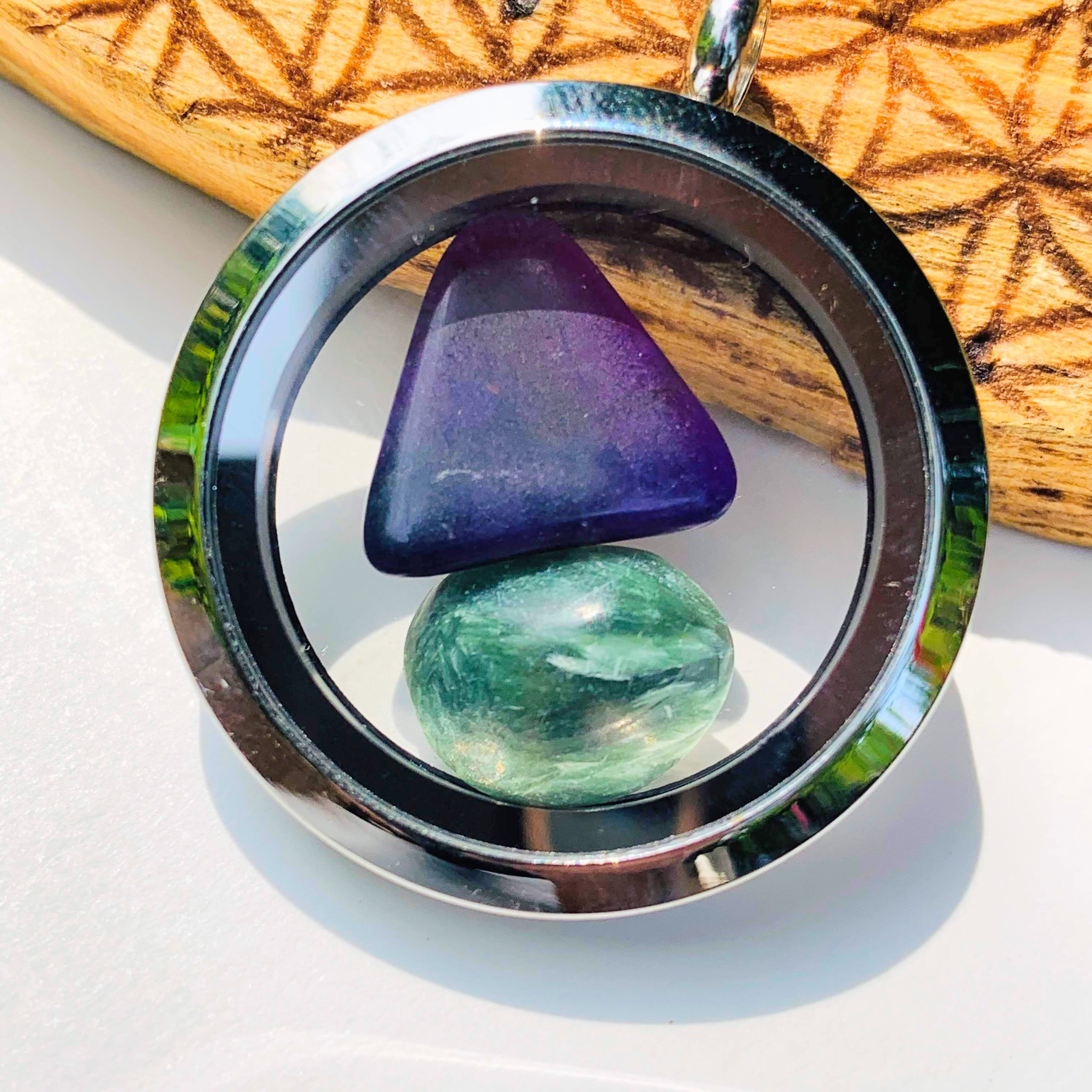 Sugilite & Seraphinite Floating stones in Locket Style Unscrewable Stainless Steel Pendant (Includes Silver Chain) - Earth Family Crystals