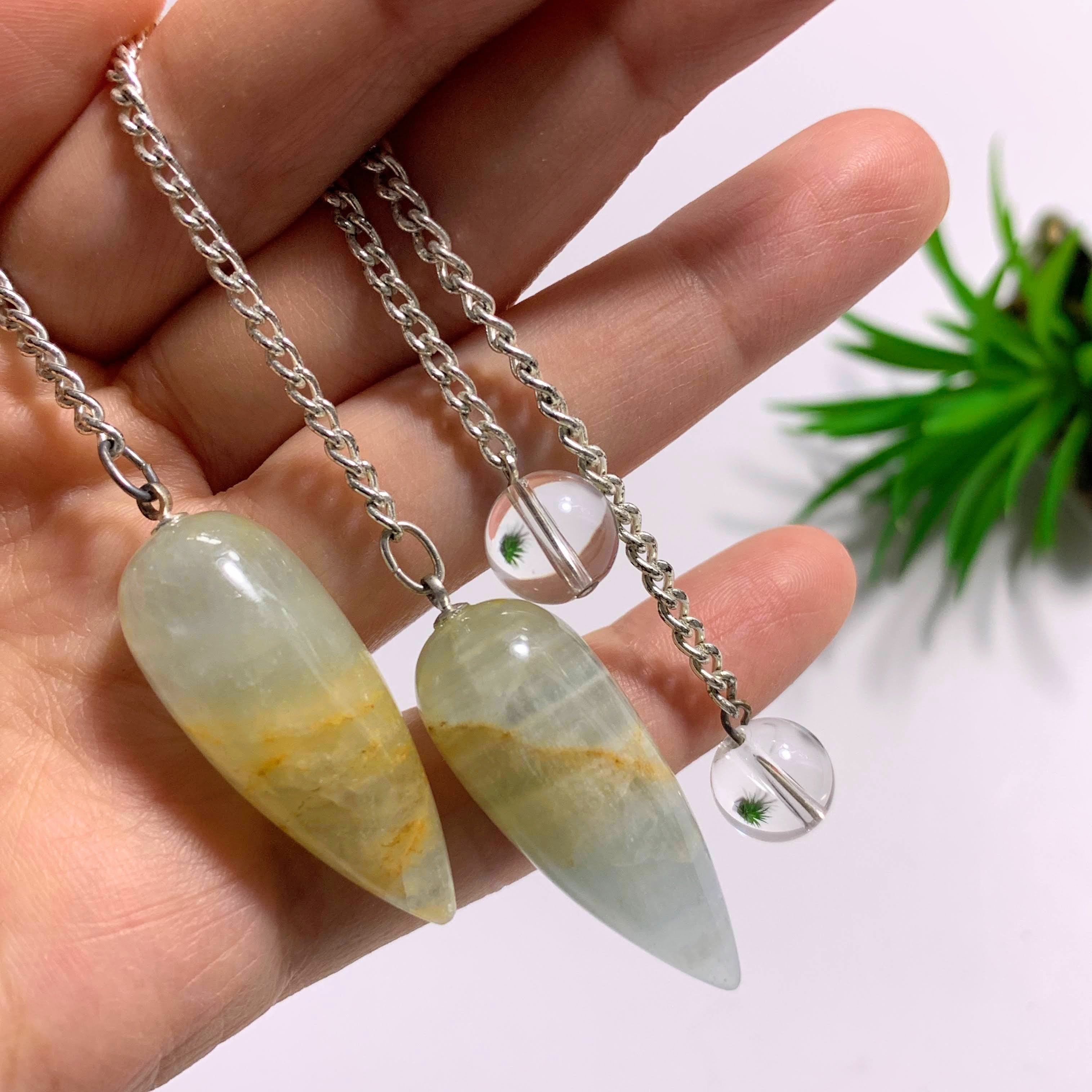 One Lemurian Aquatine Calcite Pendulum with Clear Quartz Bail