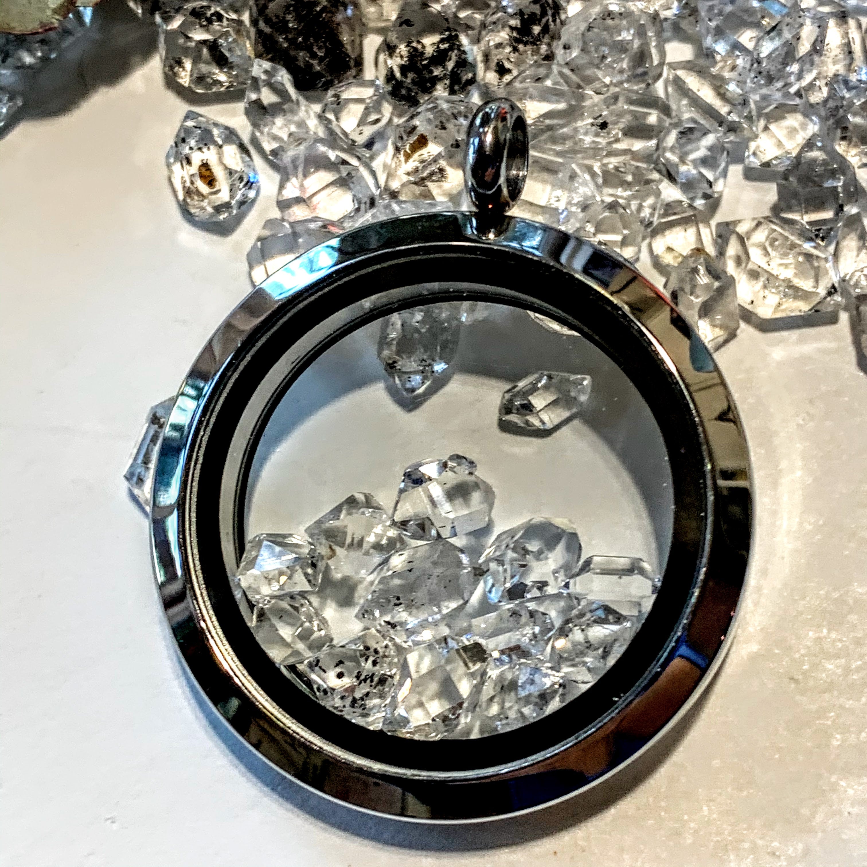 Brilliant 12 Herkimer Diamonds Floating in Stainless Steel Locket Style Pendant (Includes Silver Chain) - Earth Family Crystals