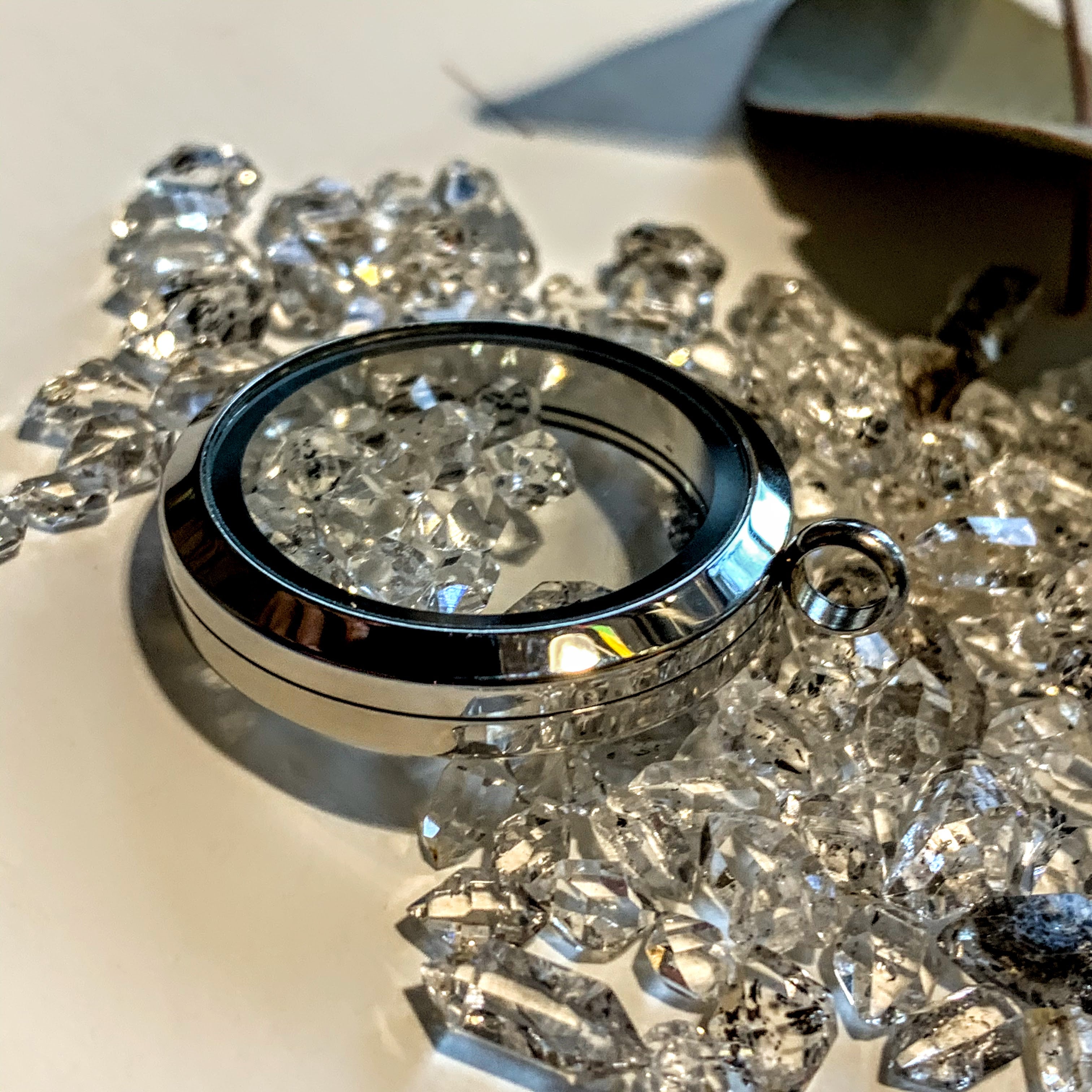 Brilliant 12 Herkimer Diamonds Floating in Stainless Steel Locket Style Pendant (Includes Silver Chain) - Earth Family Crystals