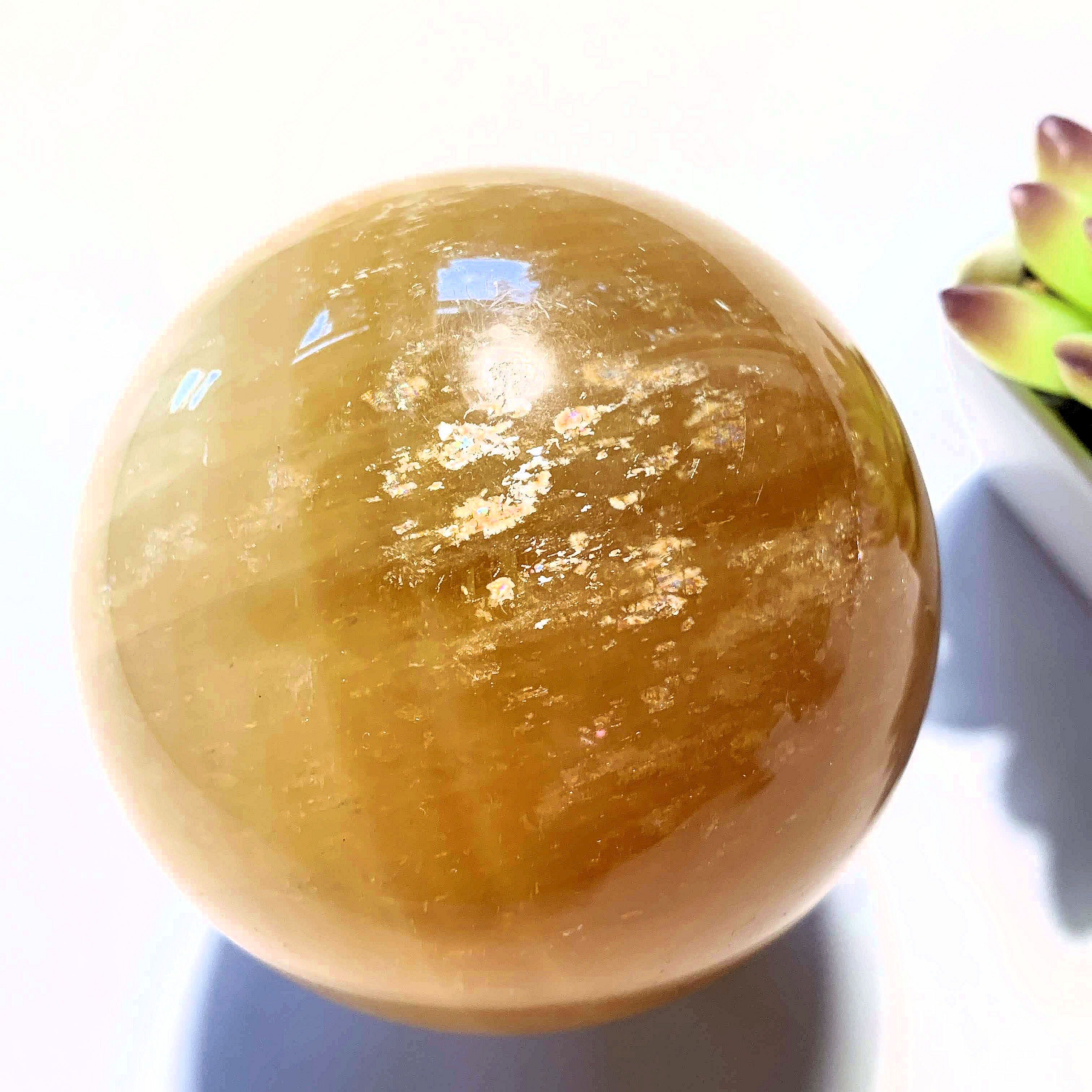 Uplifting XL  Golden Honey Calcite Sphere carving - Earth Family Crystals