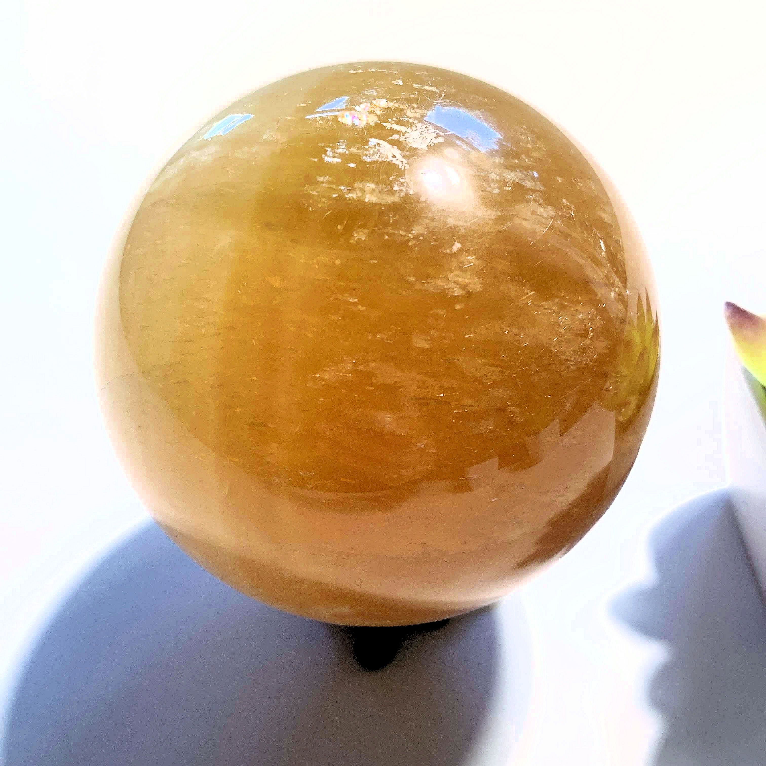 Uplifting XL  Golden Honey Calcite Sphere carving - Earth Family Crystals