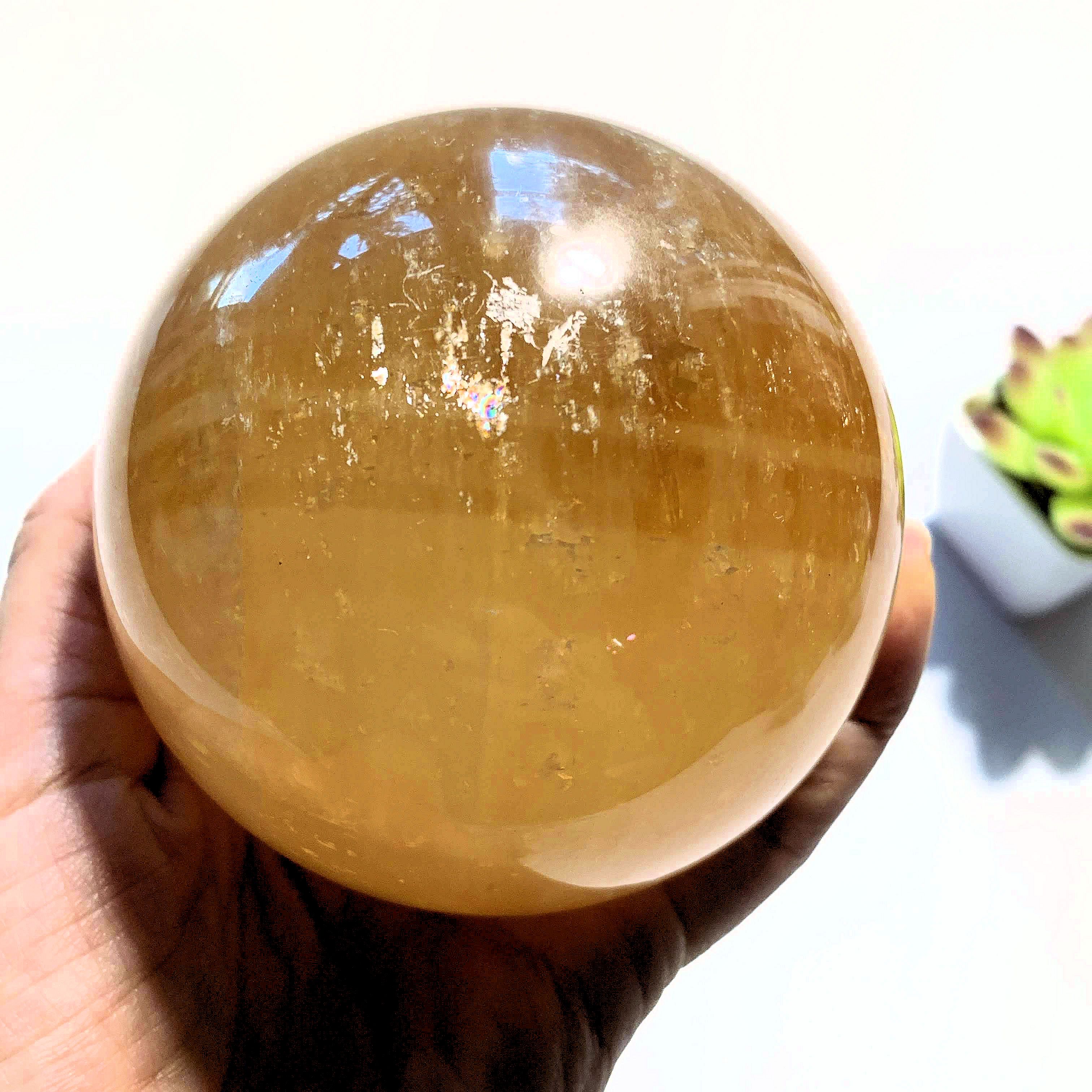 Uplifting XL  Golden Honey Calcite Sphere carving - Earth Family Crystals