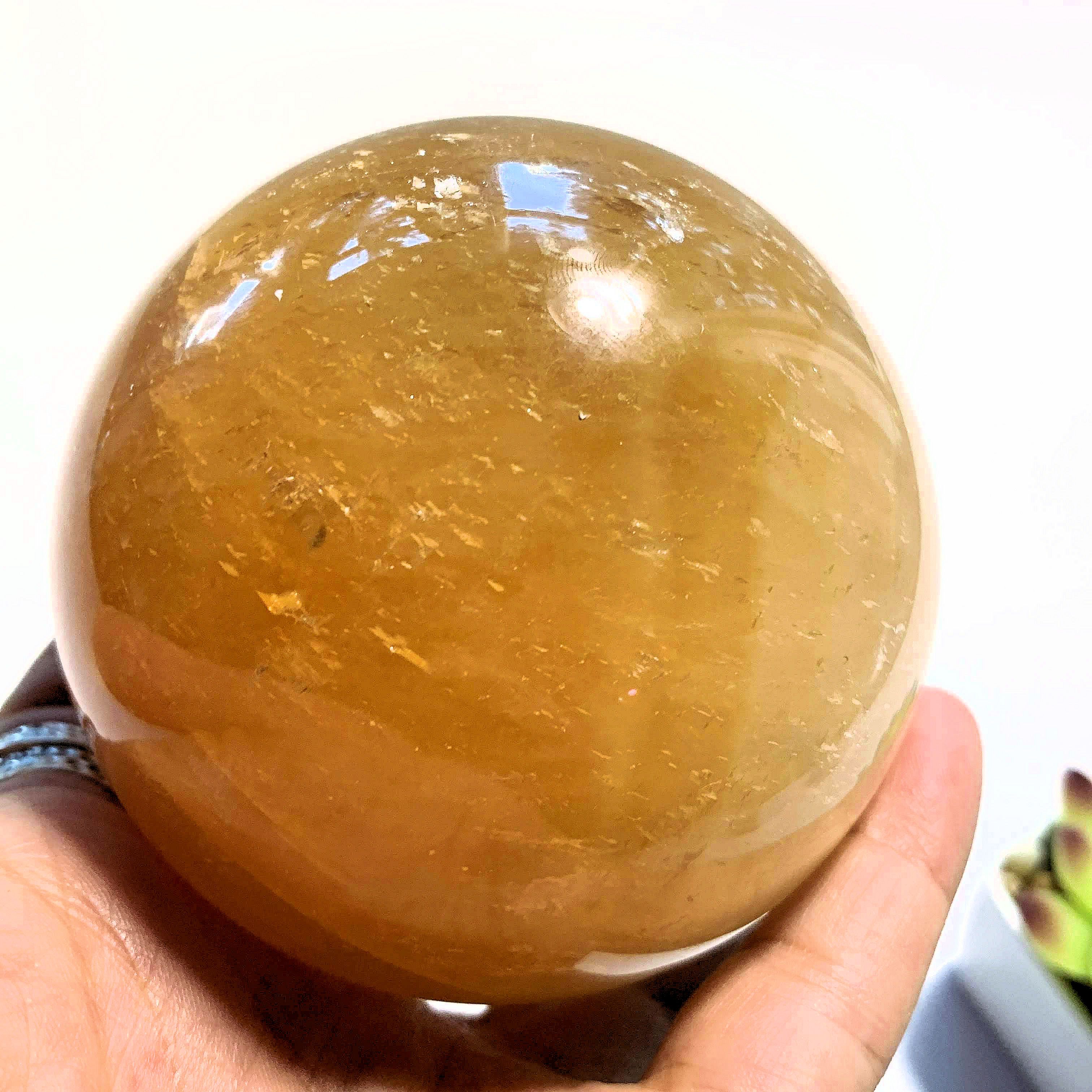 Uplifting XL  Golden Honey Calcite Sphere carving - Earth Family Crystals