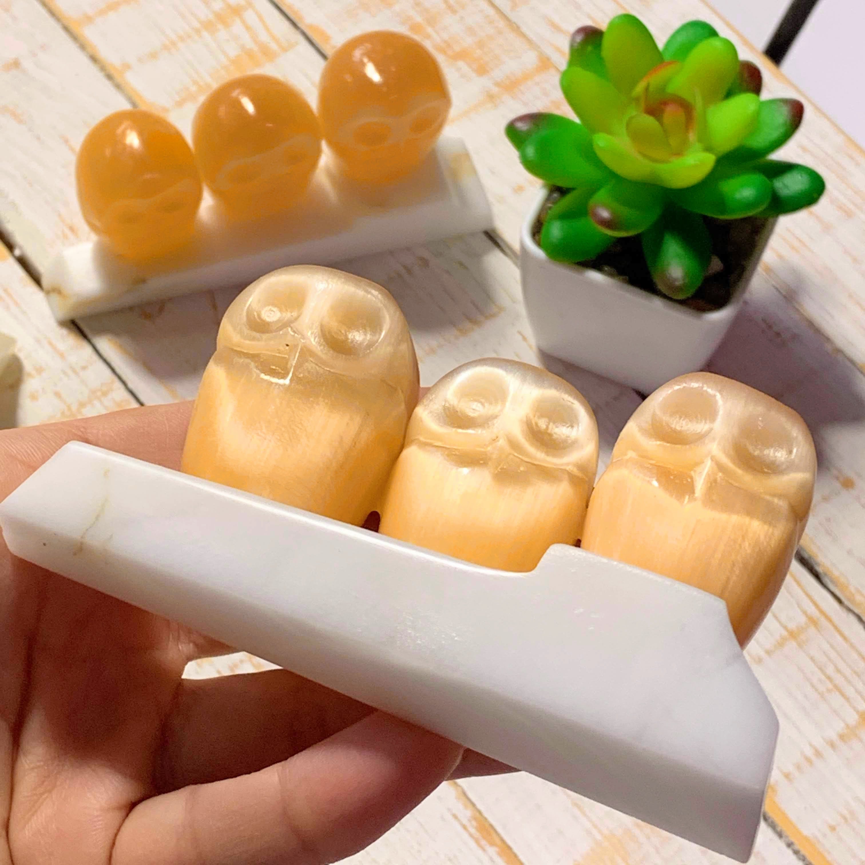 One Stunning Orange Selenite Owl Family Carving on Dolomite Stand
