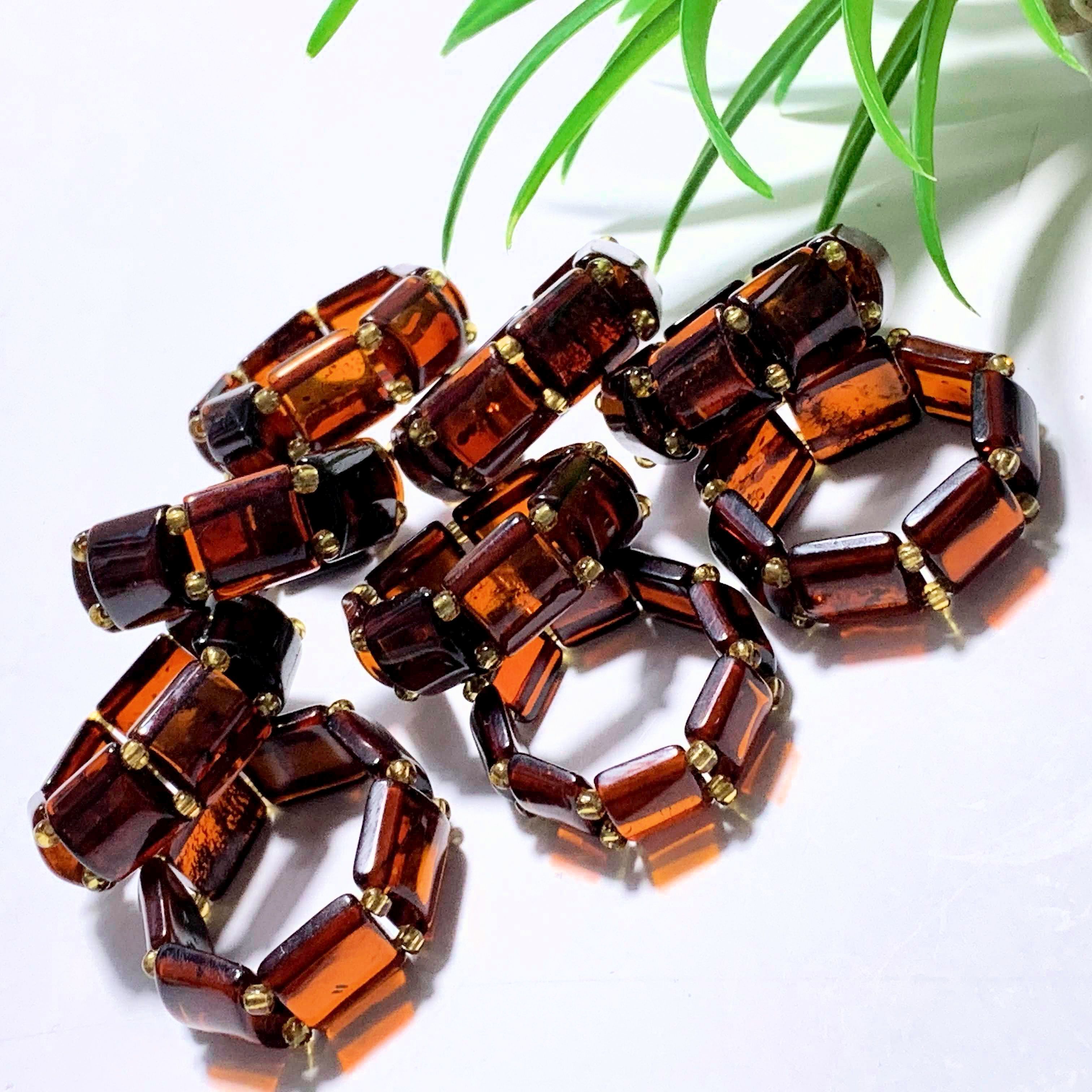 One Genuine Cherry Baltic Amber Ring on Stretchy Cord (Adjustable- Size 7-11) - Earth Family Crystals