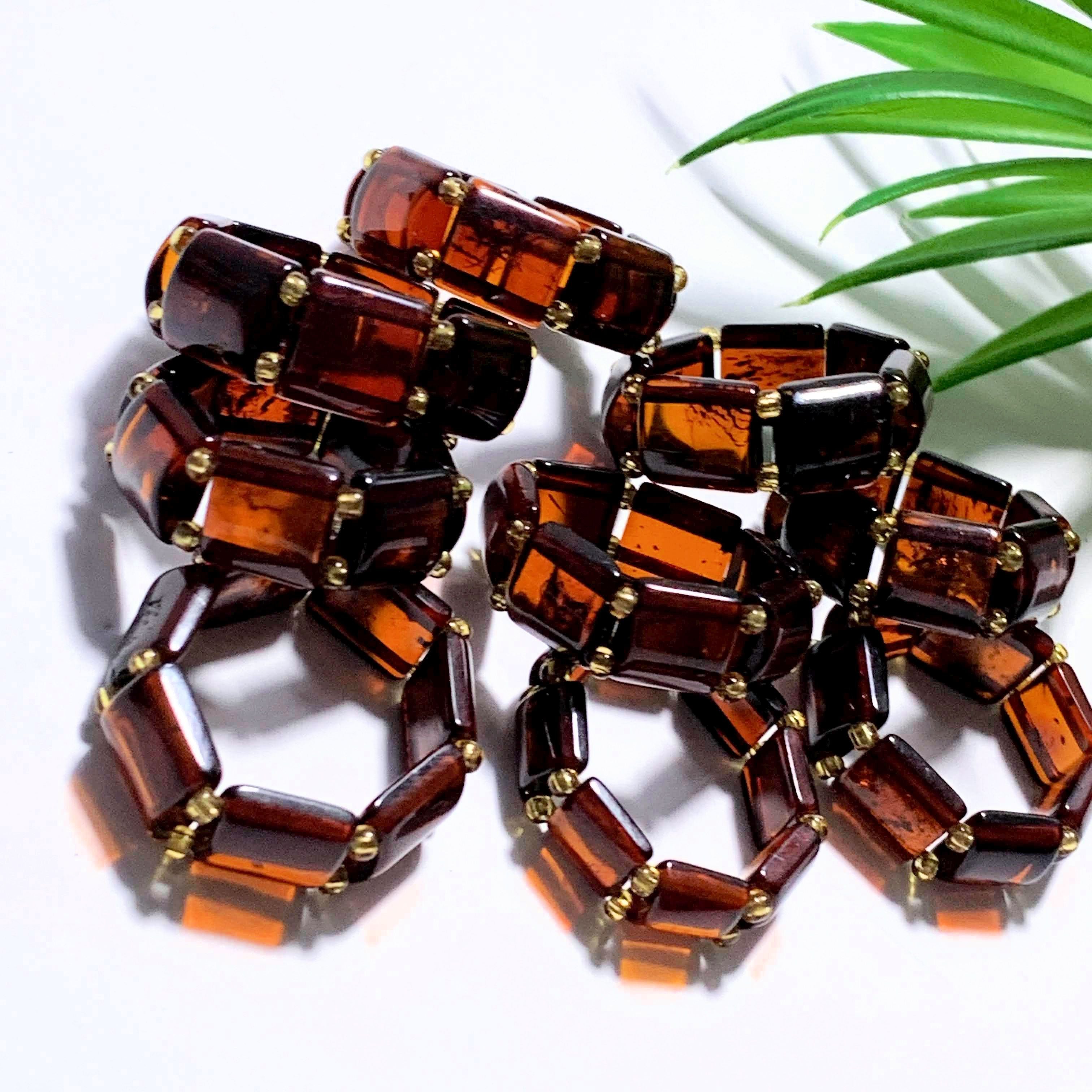 One Genuine Cherry Baltic Amber Ring on Stretchy Cord (Adjustable- Size 7-11) - Earth Family Crystals