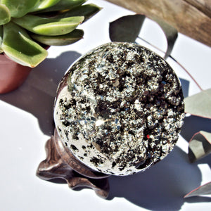 Sparkling Golden Pyrite Geode Sphere Carving From Peru