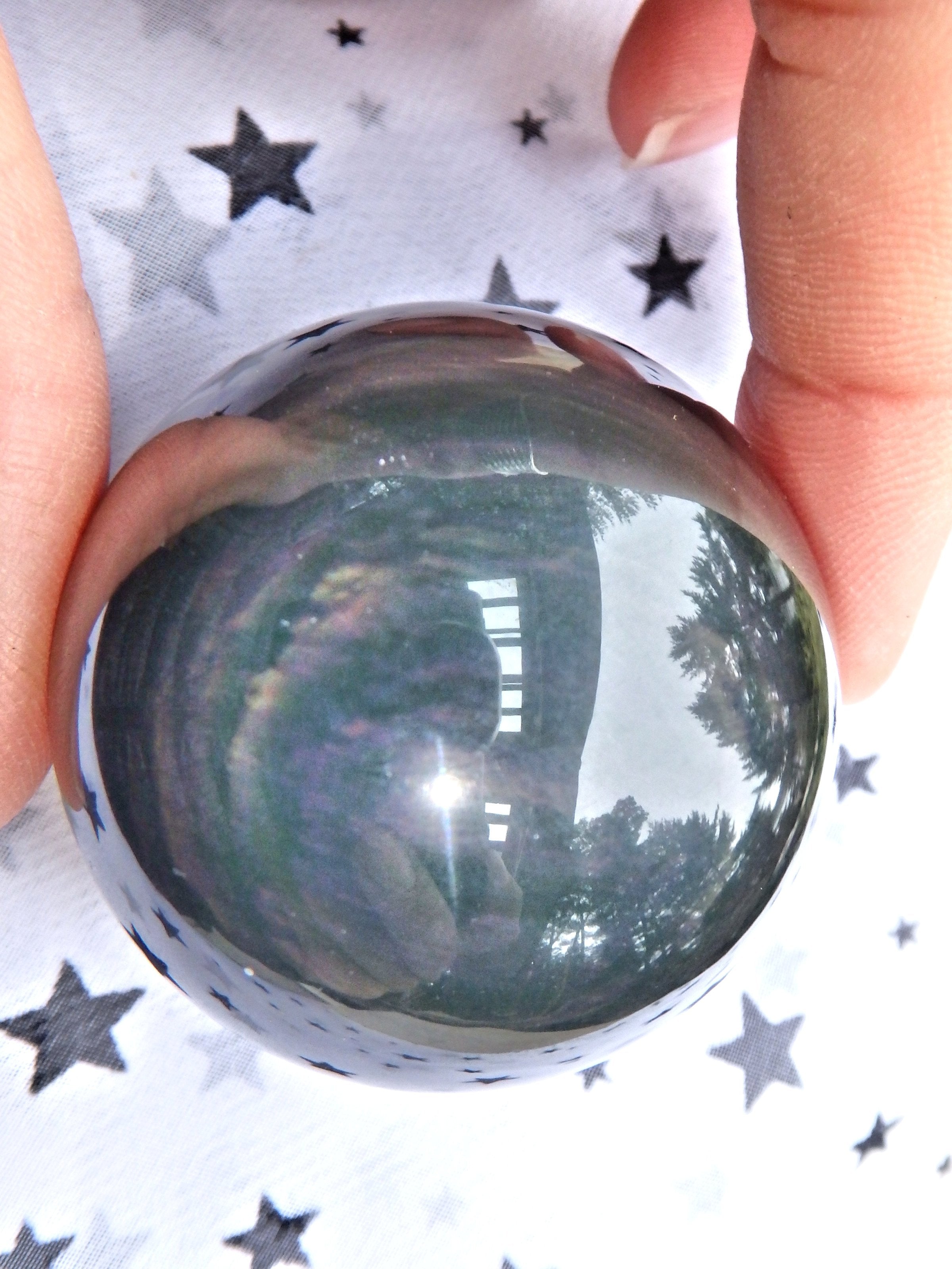 Mysterious Orbs of Flash Rainbow Obsidian Sphere Carving - Earth Family Crystals