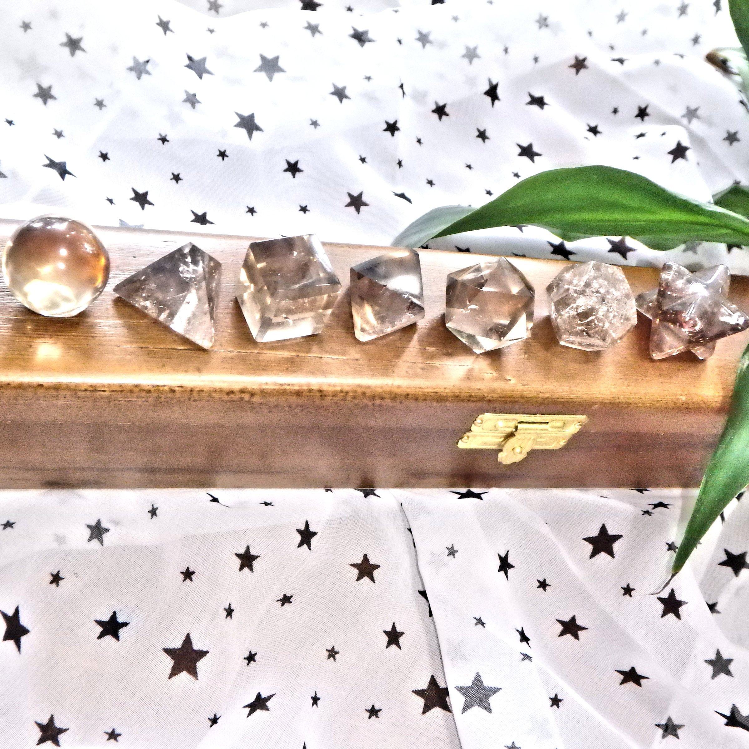 Complete 7 Stone Smoky Quartz Sacred Geometry (Platonic solids) Carvings in Protective Wood Case - Earth Family Crystals