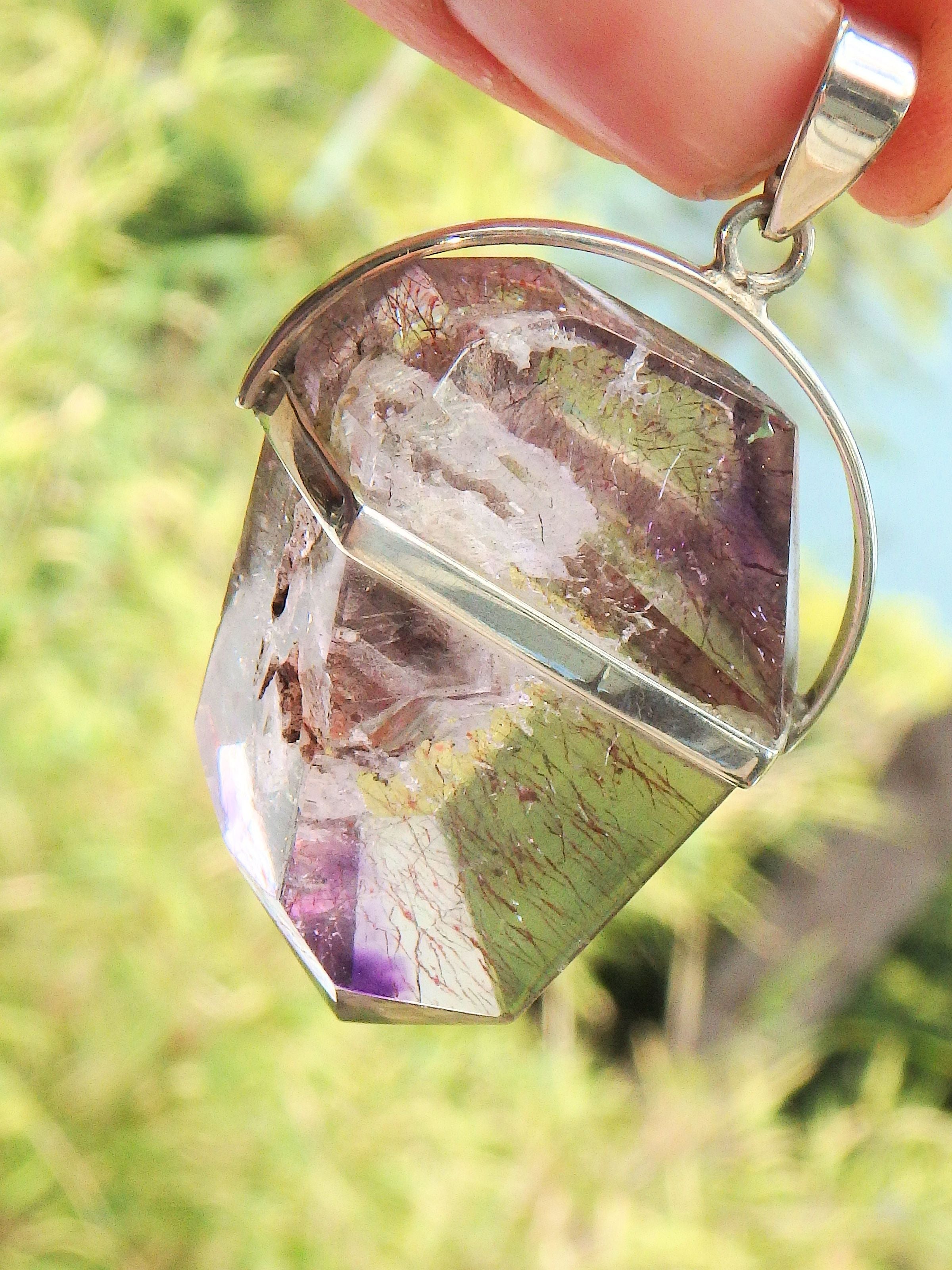 Pretty Inclusions! Chunky Super 7 (Melody Stone) Partially Polished Pendant in Sterling Silver (Includes Silver Chain) - Earth Family Crystals