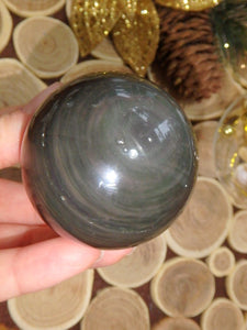 Swirls of Flashes Rainbow Obsidian Sphere REDUCED - Earth Family Crystals